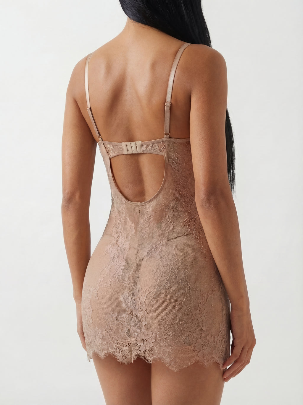 The ADORE chemise bodysuit features premium eyelash lace, nude-rose floral patterns, and feminine side slits. 