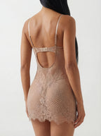 The ADORE chemise bodysuit features premium eyelash lace, nude-rose floral patterns, and feminine side slits. 