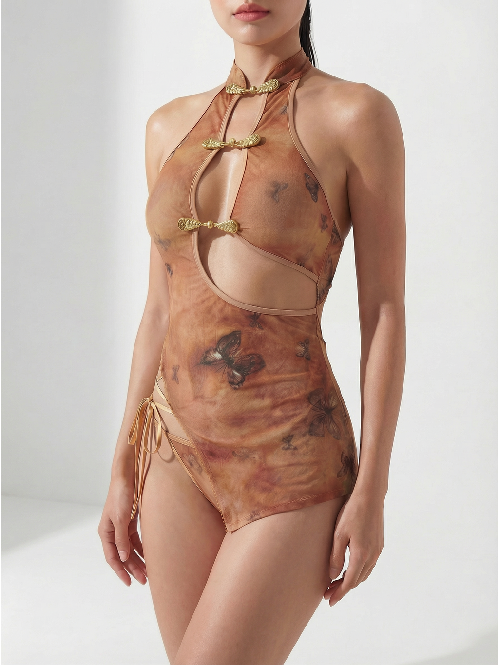 Velvet Fluxe Butterfly silk cheongsam bodysuit with gold frog buttons and side cut-outs, modern Chinoiserie style.
