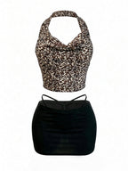 Velvet Fluxe Leo sheer leopard print halter neck bodysuit with cut-out details, luxury animal print intimate apparel.