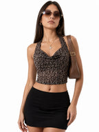 Velvet Fluxe Leo sheer leopard print halter neck bodysuit with cut-out details, luxury animal print intimate apparel.