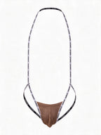 Product flat lay of the brown men's ribbed harness underwear, displaying the 3D convex enhancing pouch and flexible high-stretch lettered straps.