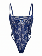 Front view of a navy blue sheer floral lace bodysuit featuring structured underwire cups and corset-style side lacing.