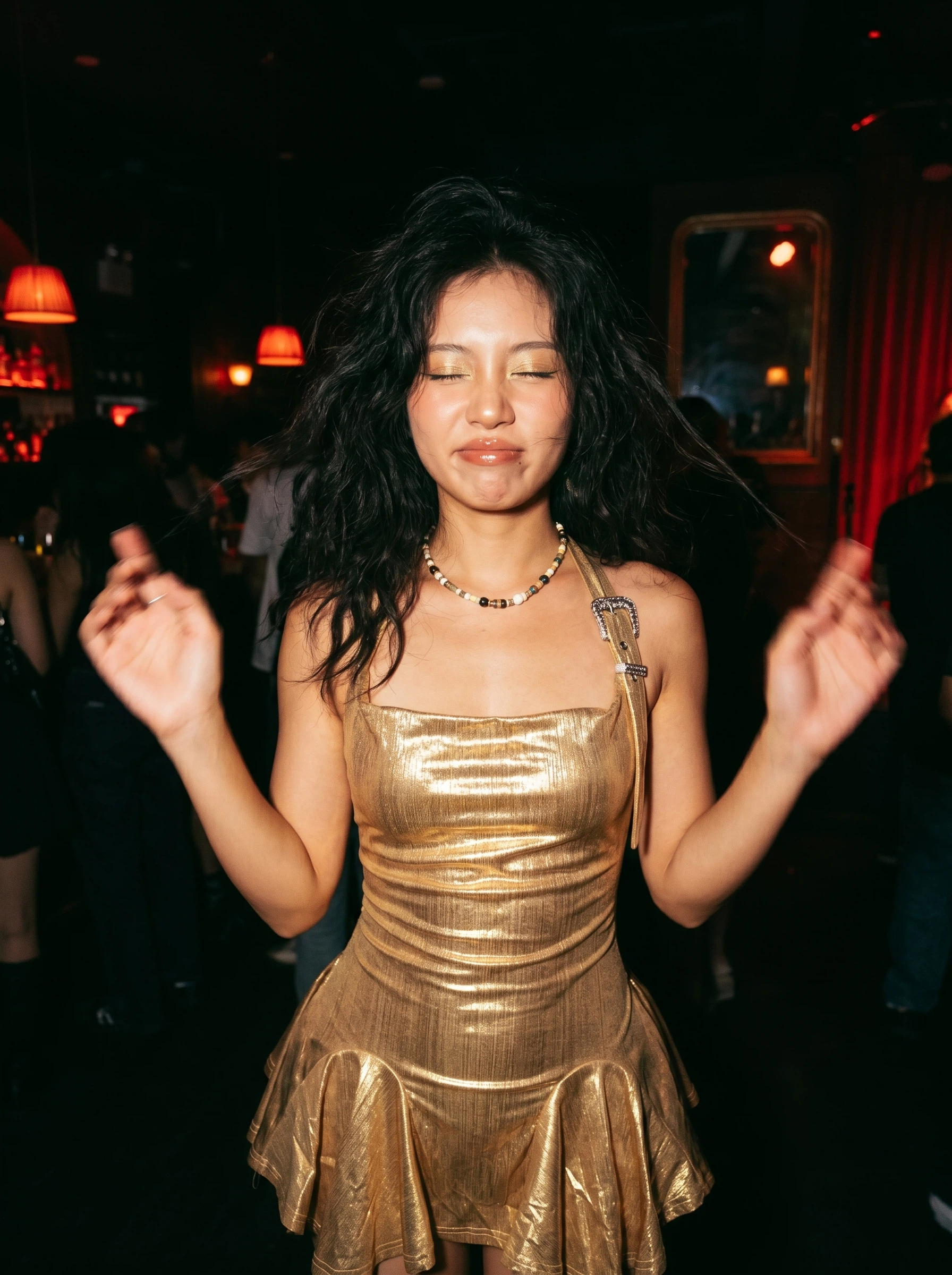 Liquid gold metallic halter neck dress with a tightly shirred bodice and playful flared hem. A quintessential Y2K millennial party outfit, detailing a vintage western buckle on the shoulder strap for an ethereal, avant-garde aesthetic.