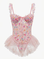 Velvet Fluxe Valerie blush pink sheer mesh slip dress featuring exposed corset boning and underwire cups, luxury romantic coquette lingerie.