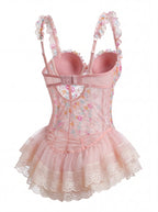 Velvet Fluxe Valerie blush pink sheer mesh slip dress featuring exposed corset boning and underwire cups, luxury romantic coquette lingerie.