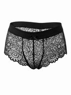 Velvet Fluxe NOCTURNE French men's sheer black lace boxer briefs. Product view showing the intricate floral lace pattern, solid black elastic waistband for support, and a subtle center bow detail.