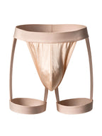 Front 3D product view of the Velvet Fluxe Homme AURUM men's champagne nude harness thong on a pure white background. Highlighting the smooth gilded fabric and integrated thigh straps.