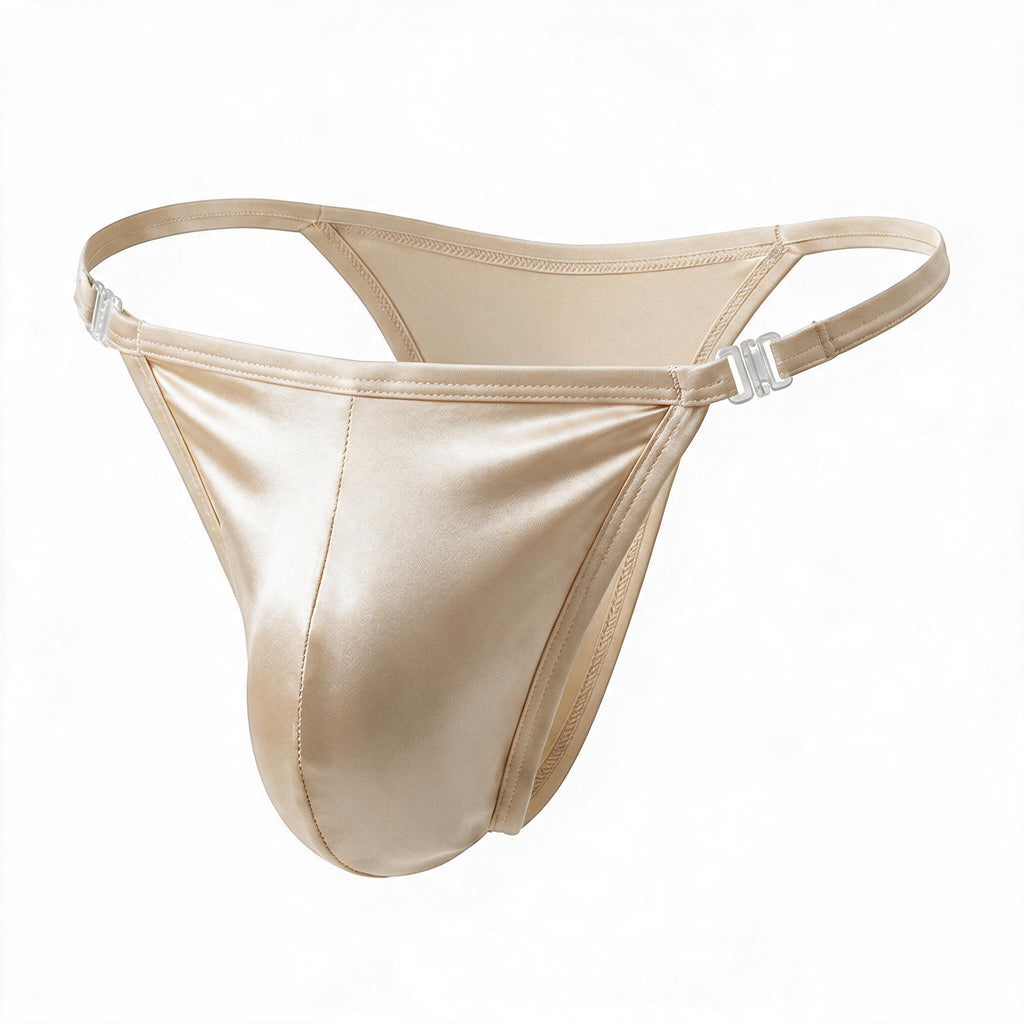 Velvet Fluxe Homme liquid beige ice silk men's thong. Front product view featuring ultra-thin glossy metallic beige fabric, a supportive pouch, and transparent side hardware on a pure white background.