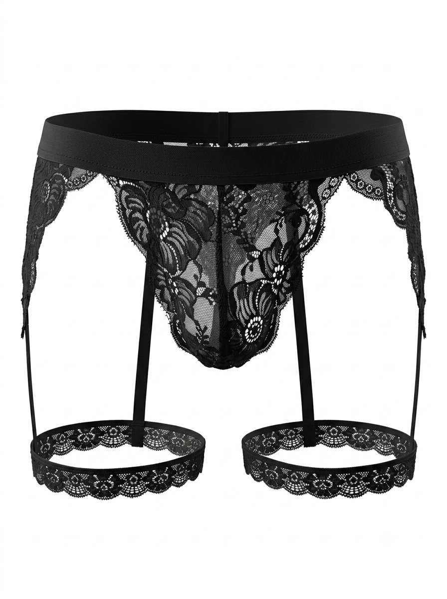 Front product view of the Velvet Fluxe Homme NOIR men's lace harness brief on a pure white background. Featuring sheer black floral lace, a soft elastic waistband, and integrated double leg garters.