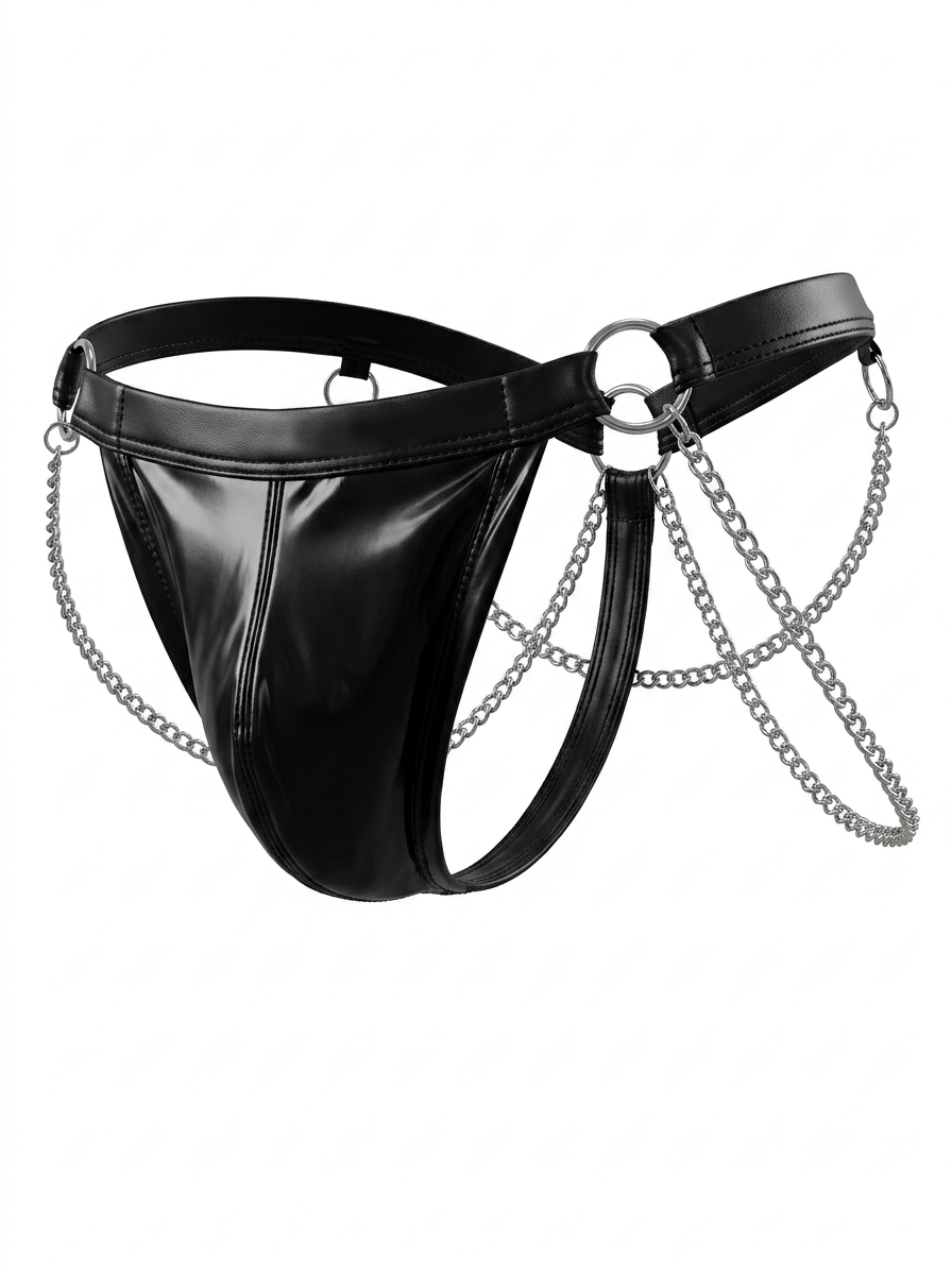 Angled product view of the Velvet Fluxe Homme ONYX wet-look chain thong. Showcasing the 3D contoured glossy black pouch, metallic silver O-ring connectors, and draped side chains against a white background.
