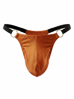 Velvet Fluxe Homme men's rust orange thong underwear. Front product view detailing the vibrant warm glossy 3D pouch, gold metal O-rings, and sleek black straps on a pure white background.